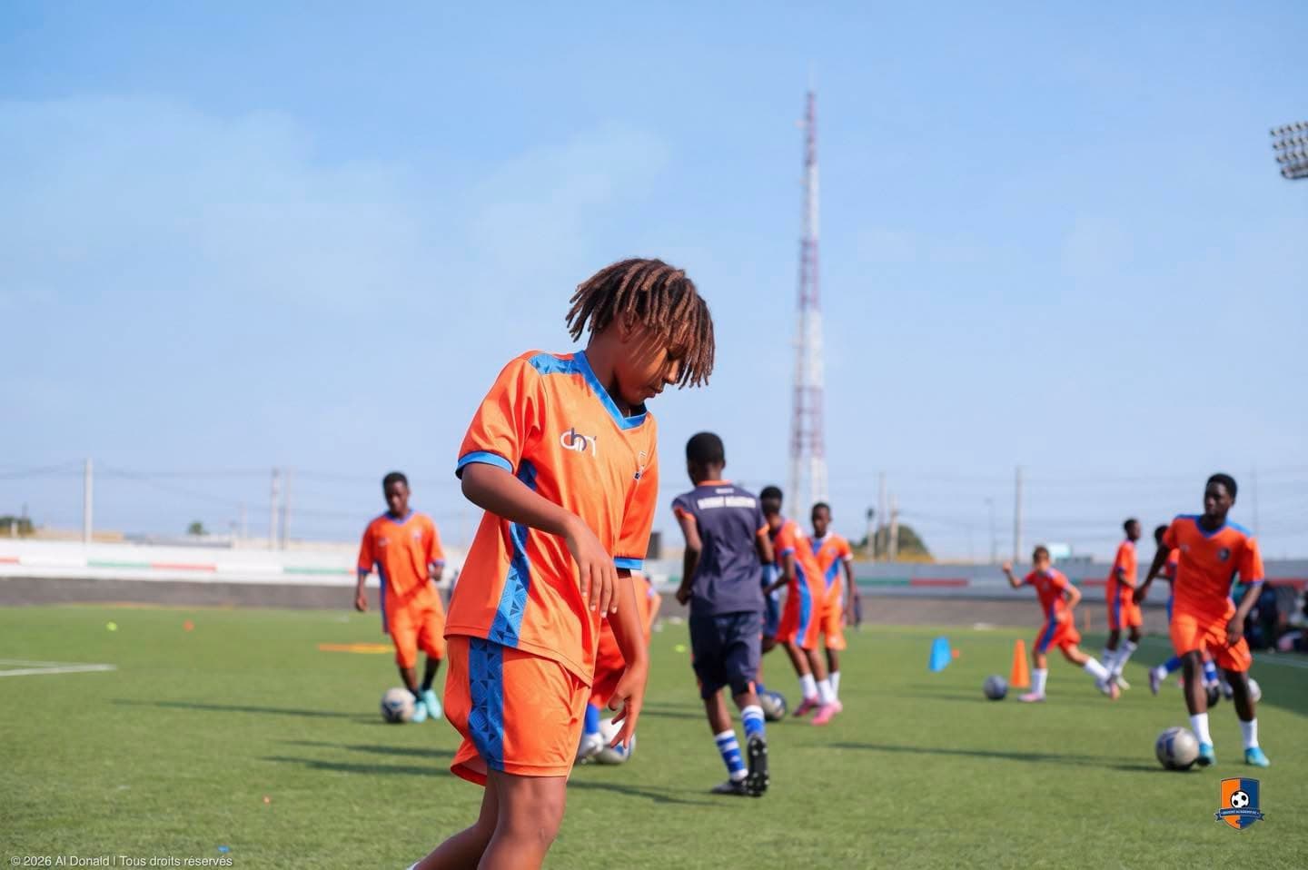 Bright Academy players training on the pitch